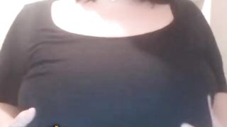 Brunette Spits on Giant Tits