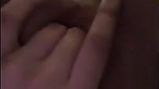 Amateur babe is rubbing her pussy in front of the camera and moaning while cumming