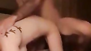 Small titted, amateur girl is sucking her lover's cock and getting fucked from the back