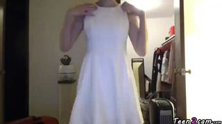 A girl shows her clothes front the webcam