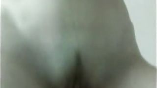 Milk is dripping from the breast of a pregnant mother