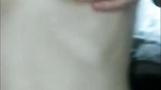 Milk is dripping from the breast of a pregnant mother