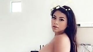 Alva Jay rubbing her naked juicy body with body lotion