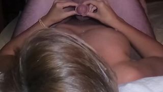 I jerk his cock on her back and take a huge load in her hair and on my big natural tits
