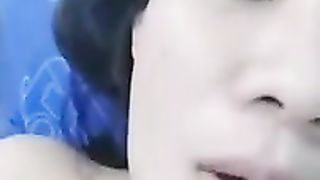 Asian brunette is trying to film a homemade porn video, because she wants to become a pornstar