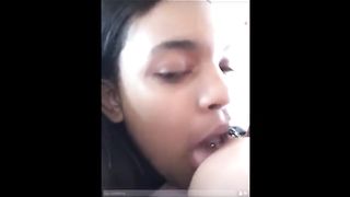 Girl Sucking her Girlfriend's Pierced Tits