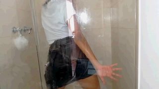 Leather Skirt and White T-shirt Wet Shower Fun against Glass