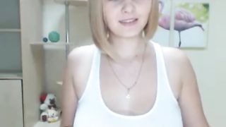 Dirty minded teen babe is showing her very big boobs, in front of the webcam