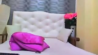 Drop dead cute webcam girl tries out different kinky outfits for her show